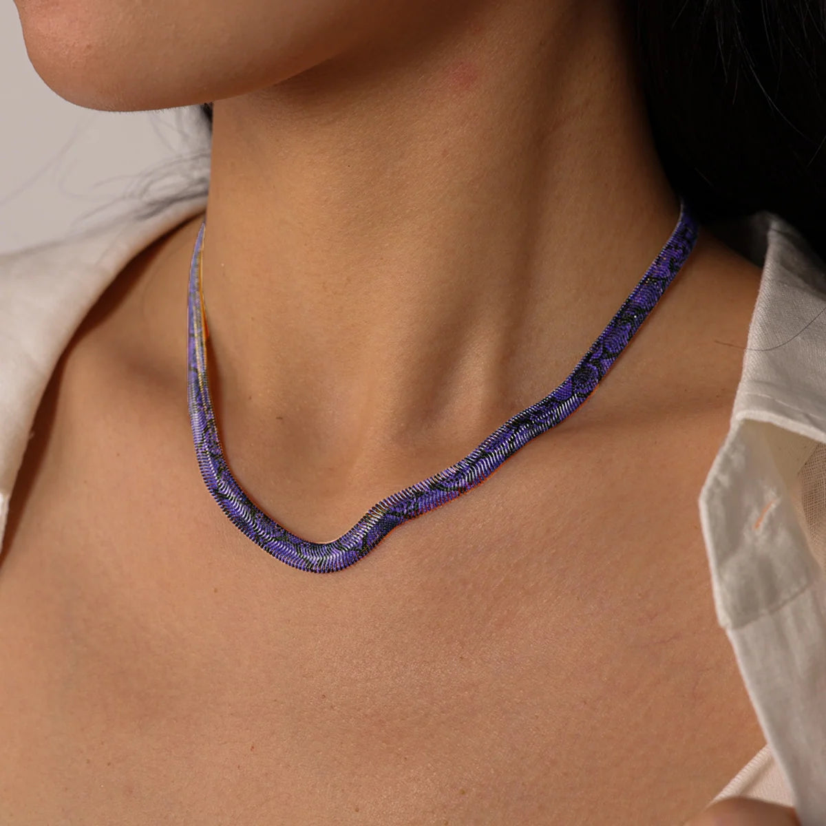 Royal Purple snake chain necklace worn
